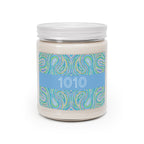  1010 angel number soy candle with lid, featuring Eden chakra art