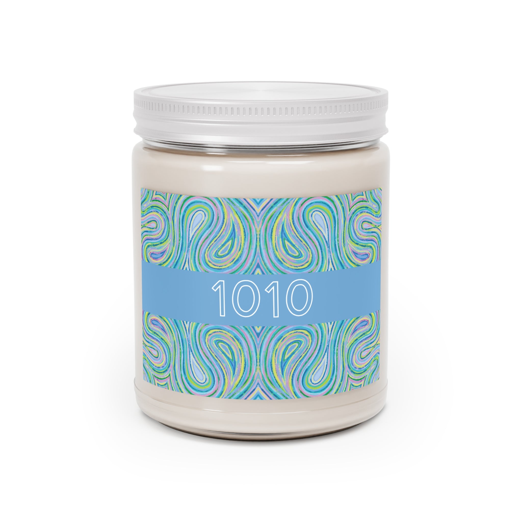  1010 angel number soy candle with lid, featuring Eden chakra art