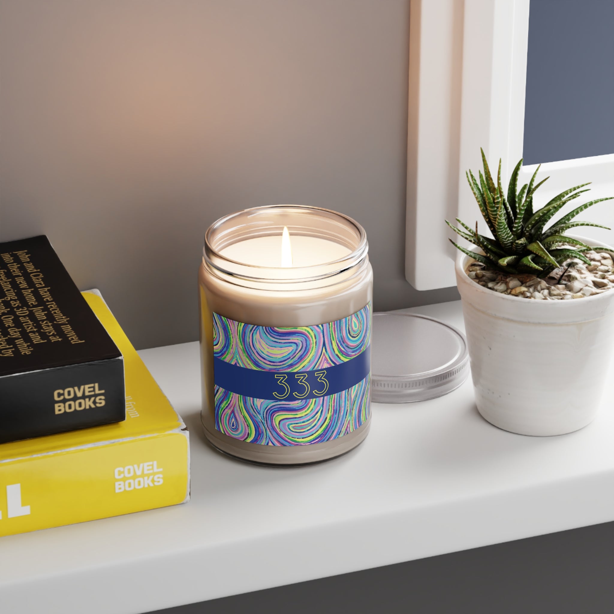  333 angel number candle styled on a shelf