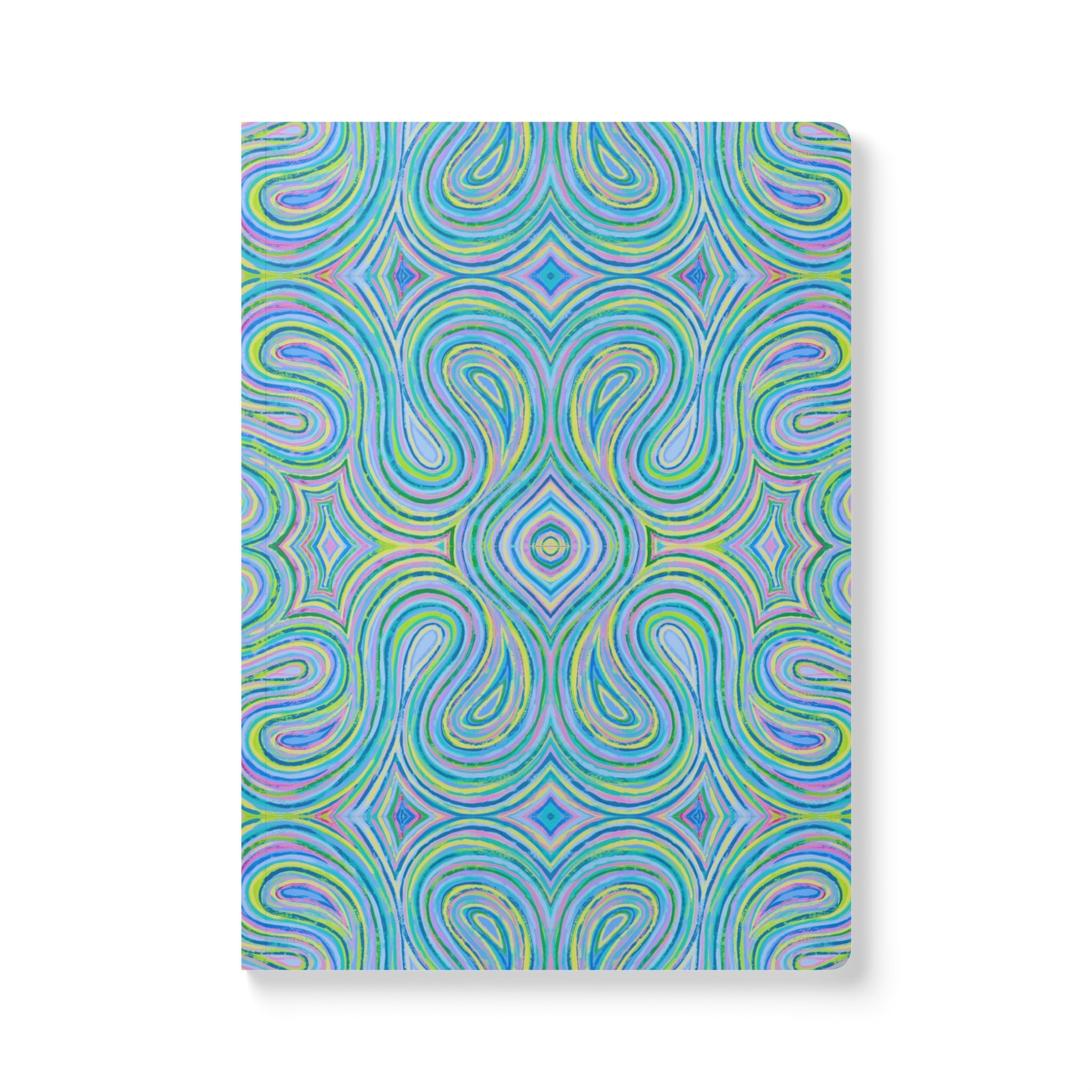  Front cover of The Eden Journal, a self care journal featuring original chakra art in pastel blue, green, yellow and pink