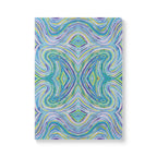 Front cover of The Meadow Journal, a self care journal featuring original chakra art in pastel blue, green, yellow and purple