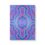  Front cover of The Melody Journal, a self care journal featuring original chakra art in pink, purple and blue